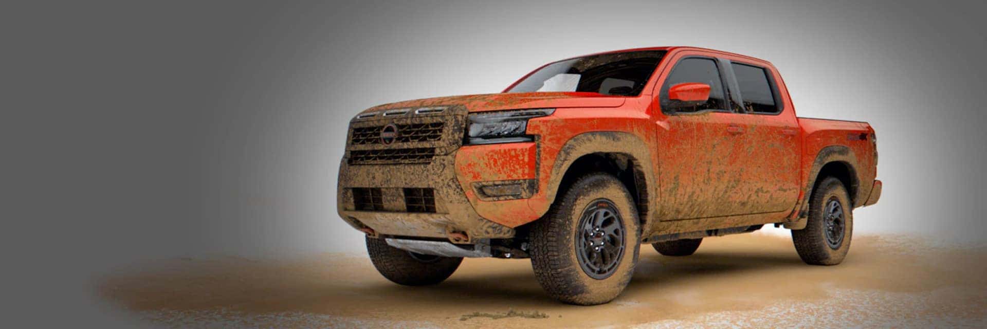 2026 nissan frontier covered in mud