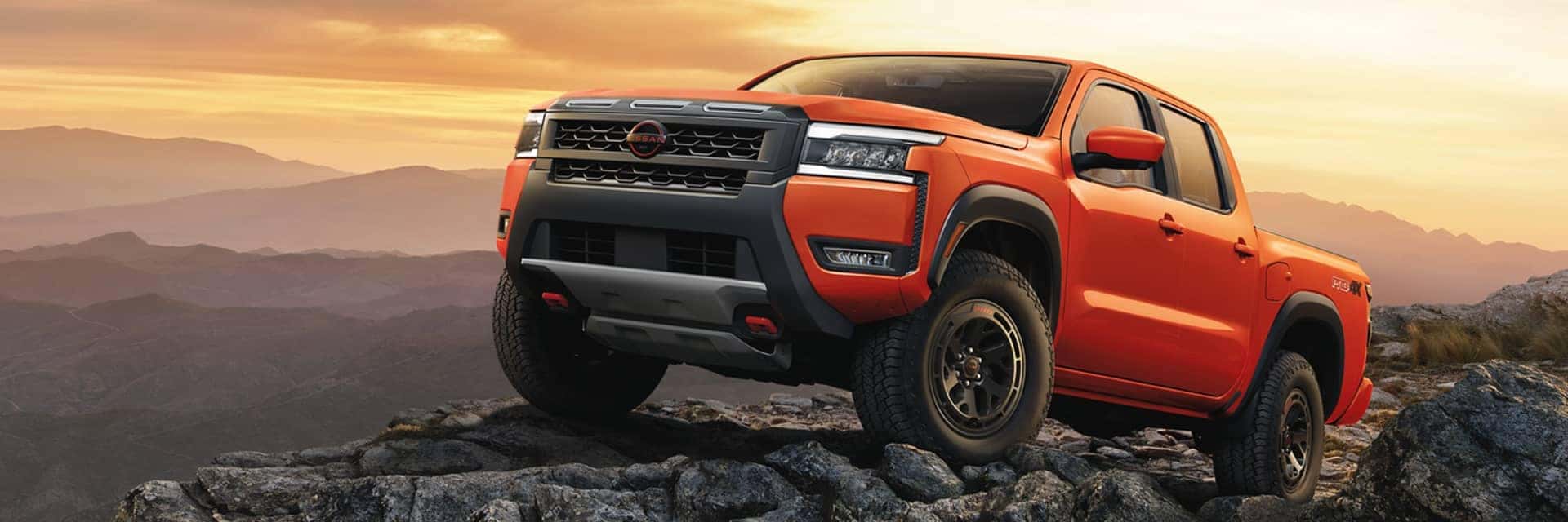 2026 frontier parked on rocks