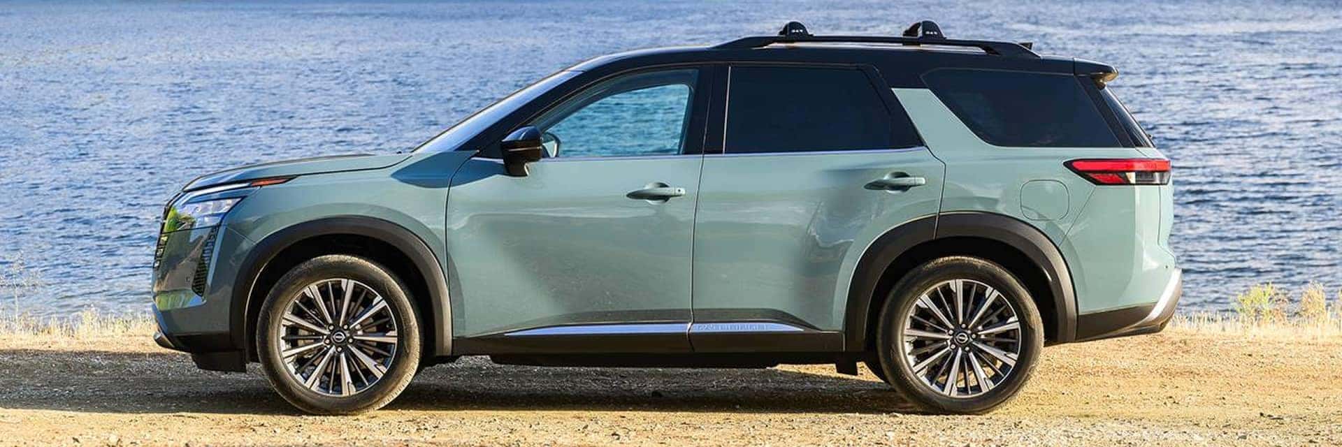 2026 nissan pathfinder parked in front of water