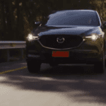 Gray Mazda CX-5 Driving