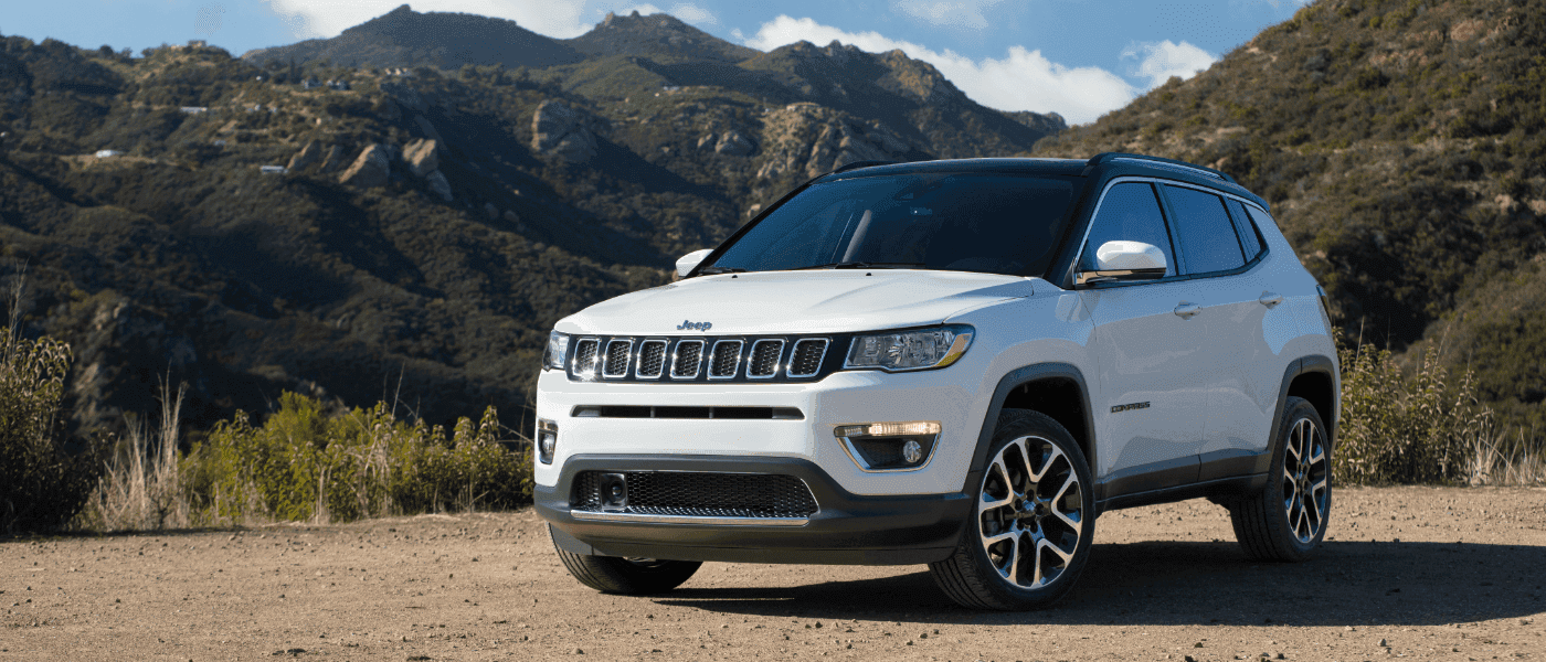 2021 White Jeep Compass Parked in the Mountains