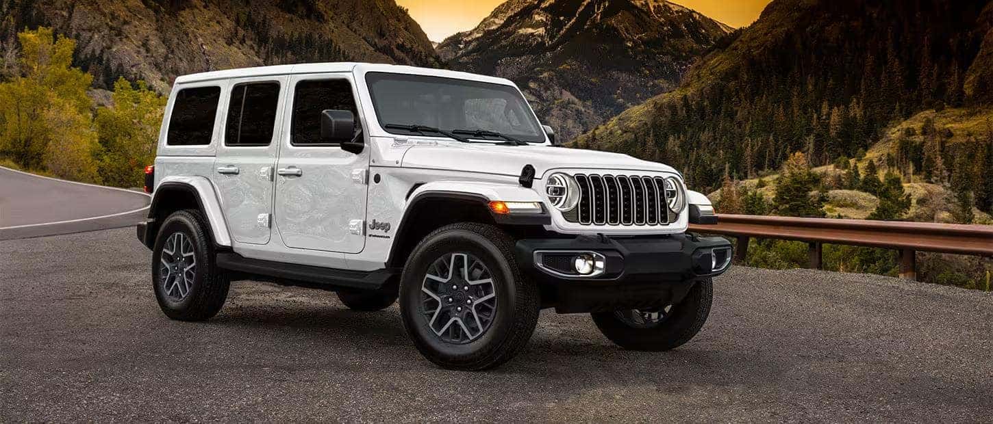 2020 Silver Jeep Wrangler Towing a Boat