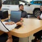 Customer visiting a car dealership to choose and buy a new car with Car Finance Near Philadelphia, PA options available.