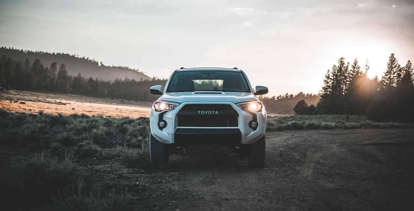 White Toyota Tacoma pickup truck, available with Used Car Finance options.