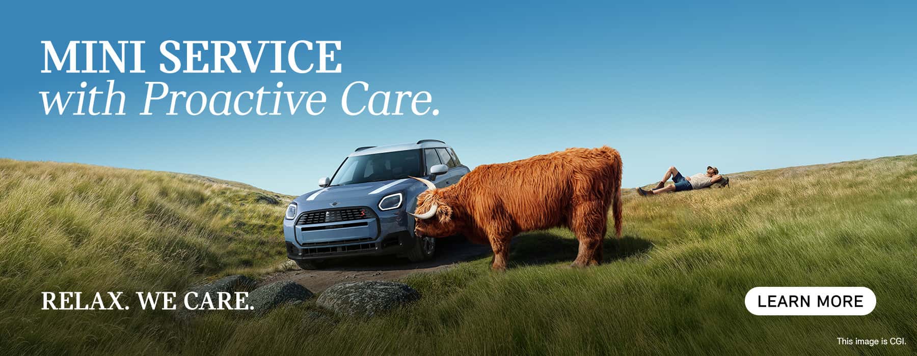 MINI Countryman driving through the fields with a cow.
