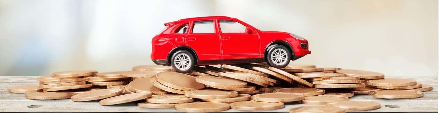 Car on top of penny pile