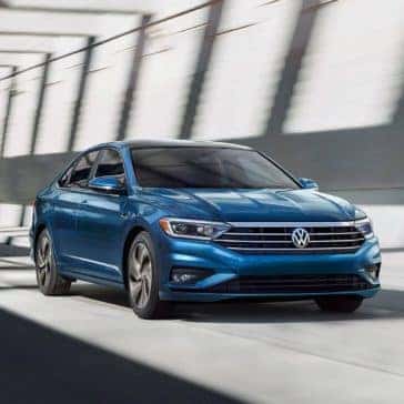 2019 Jetta SEL premium in silk blue metallic driving