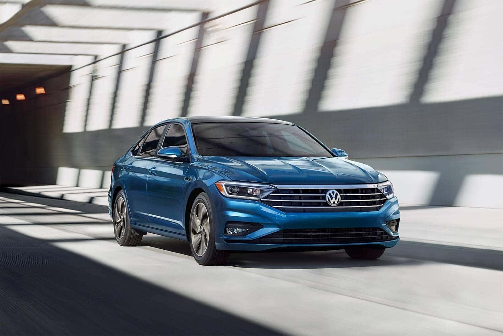 2019 Jetta SEL premium in silk blue metallic driving