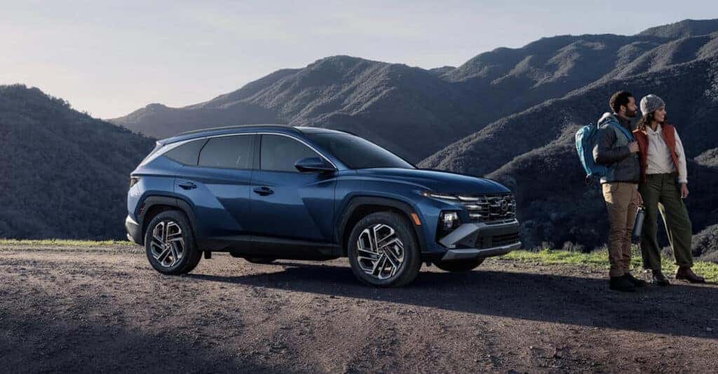 2026 TUCSON Hybrid in blue used in nature