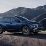 2026 TUCSON Hybrid in blue used in nature