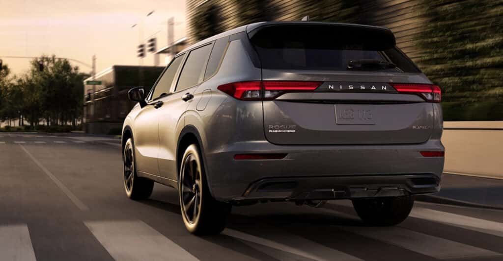 Rogue Plug-in Hybrid grey driving on road
