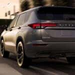 Rogue Plug-in Hybrid grey driving on road