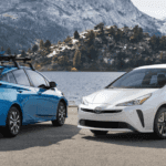 two 2020 Toyota Prius configurations near mountain