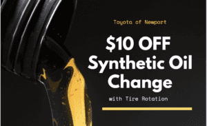 image with a black background. There is a black plastic container pouring liquid that looks yellow gold. The liquid is supposed to represent motor oil. On the right side it says 'Toyota of Newport. $10 off synthetic oil change with tire rotation" in white and yellow lettering. 