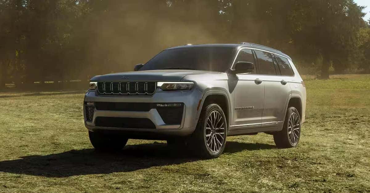 A 2026 Jeep Grand Cherokee parked on a grassy area