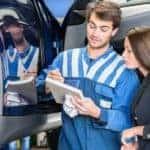 Mechanic going over the importance of regular maintenance