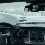POV from the driver's seat of a 2023 Dodge Challenger R/T racing on the track, epitomizing the R/T meaning